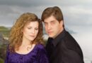 Portrait of Randy and Pamela Copus, founding members of the New Age band 2002, with a mystical Irish landscape background.